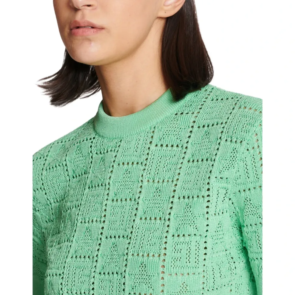 Dzianinowy sweter z ażurowym monogramem