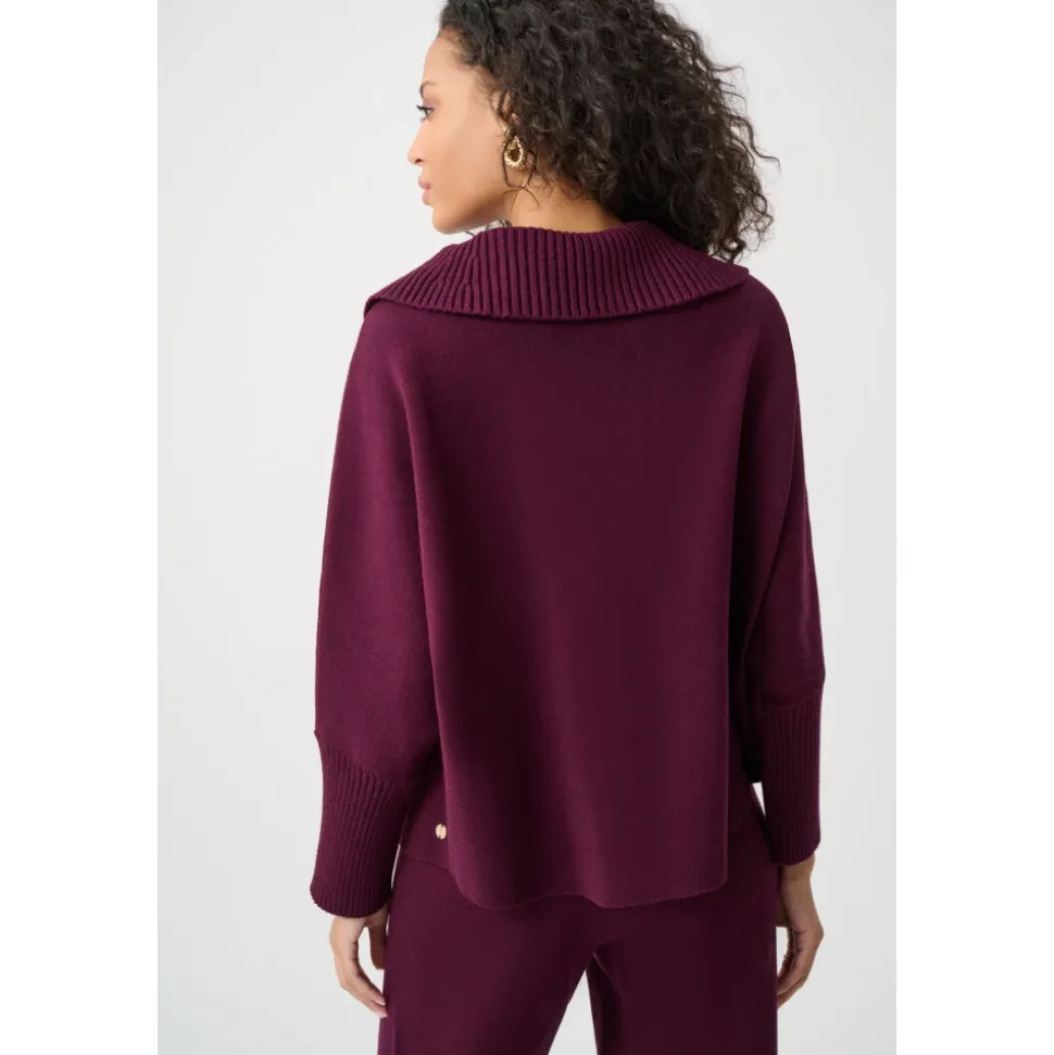 Sweter o luźnym kroju z zapięciem na guziki
