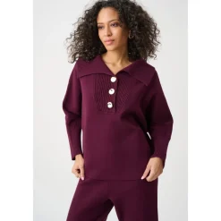 Sweter o luźnym kroju z zapięciem na guziki