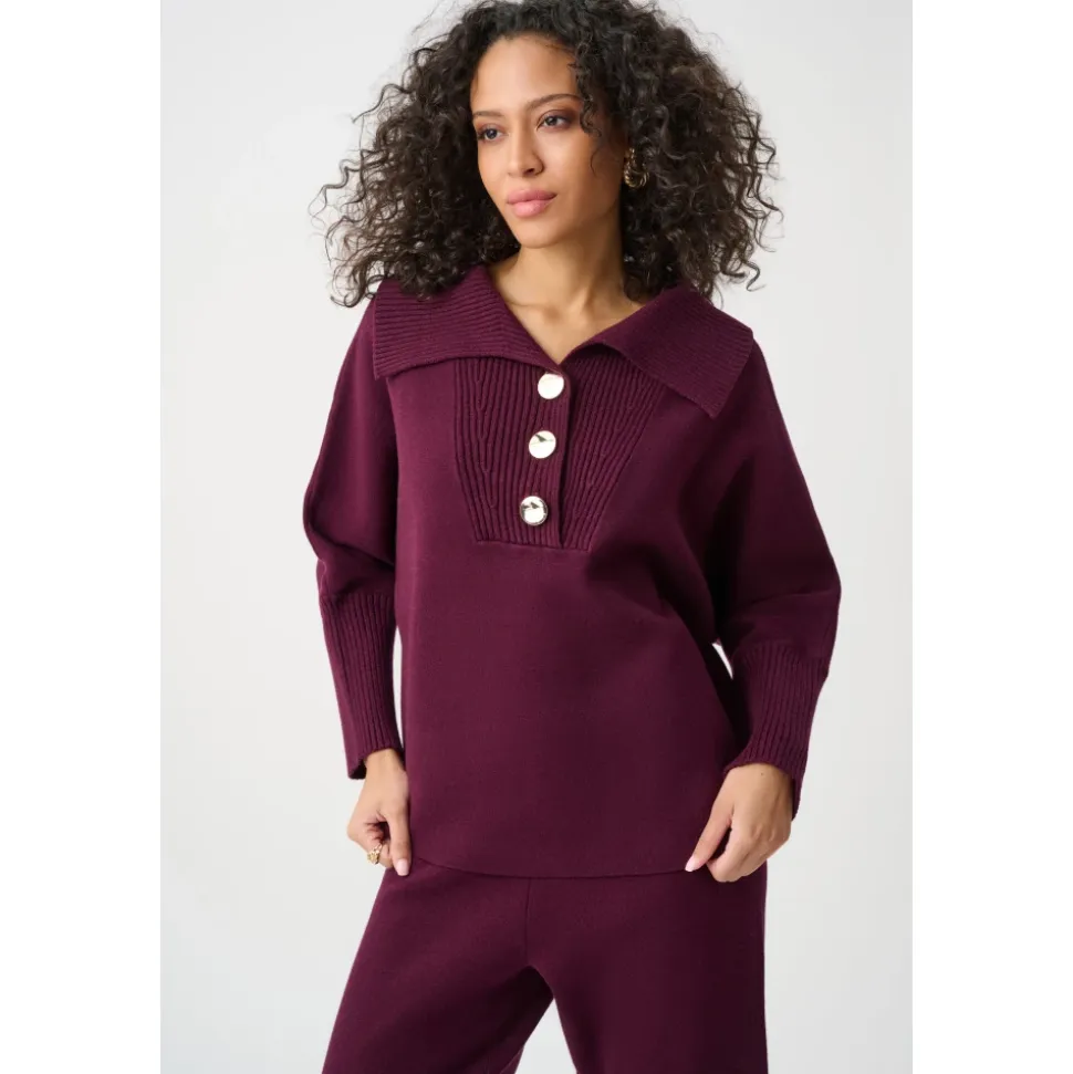 Sweter o luźnym kroju z zapięciem na guziki